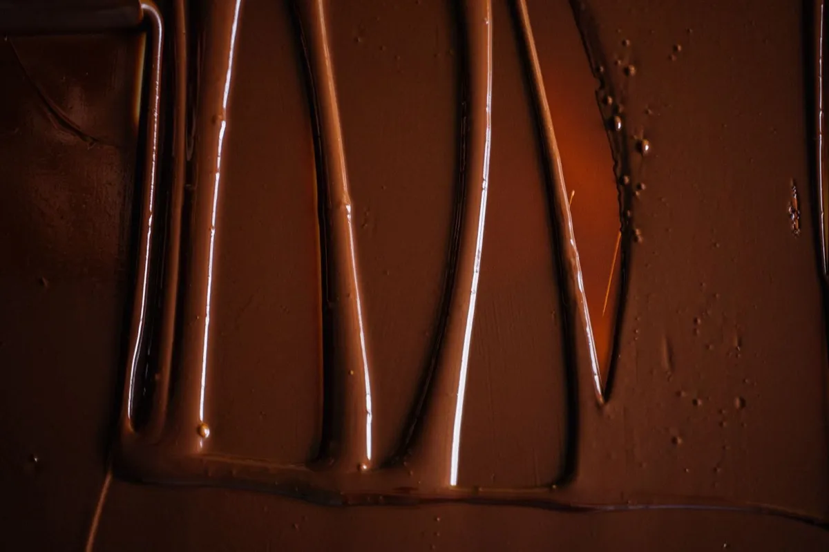 Glossy melted chocolate with spread trails